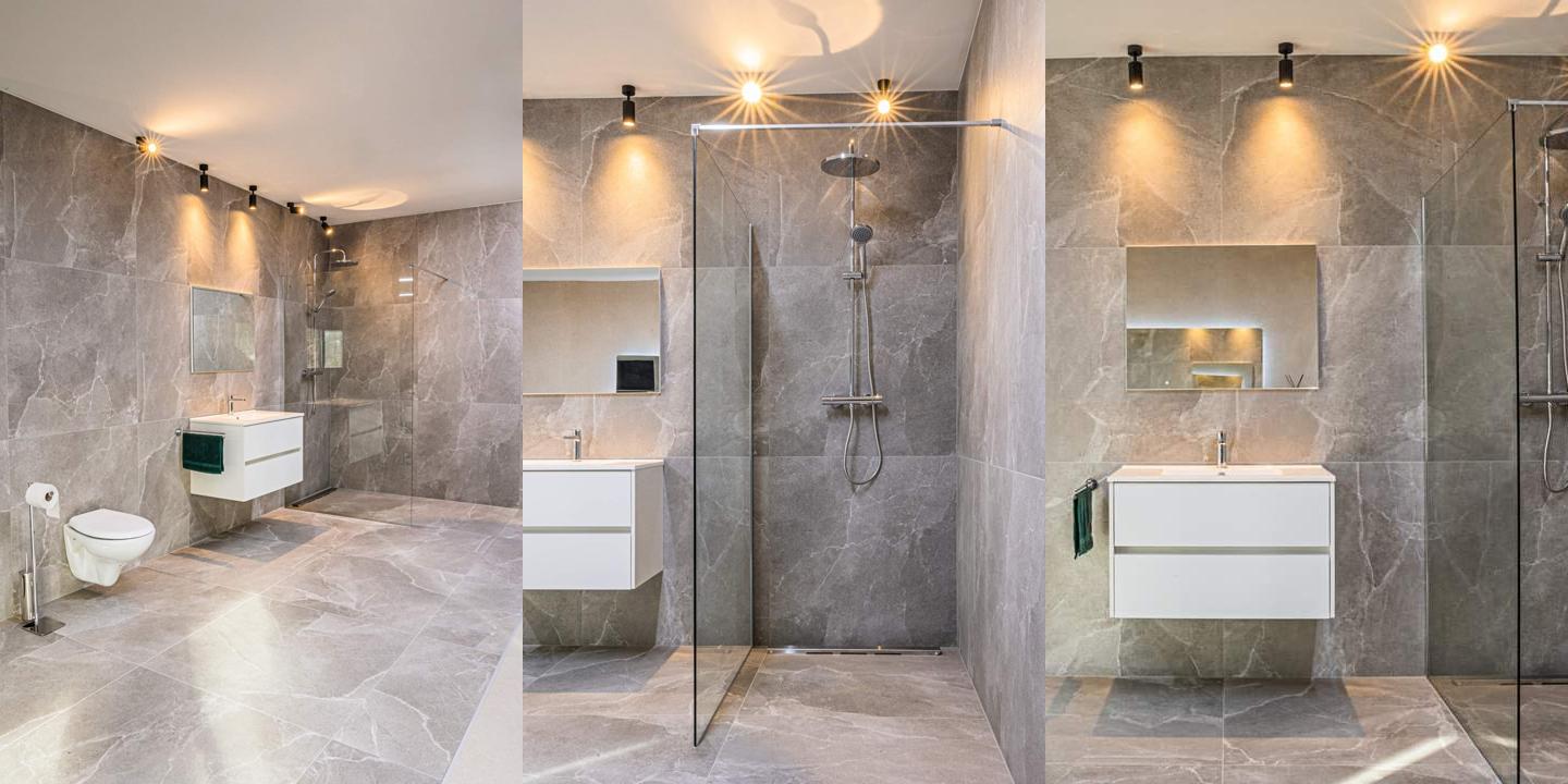 Salle de bains rénovée avec sanitaires et carrelage